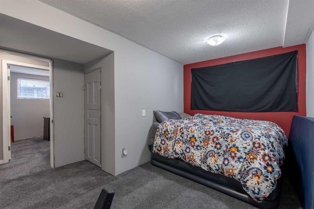 1907 7A Avenue North, Lethbridge, AB - Indoor Photo Showing Bedroom