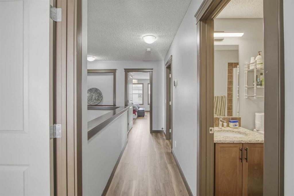 13 Evanscove Manor Nw, Calgary, AB - Indoor Photo Showing Other Room