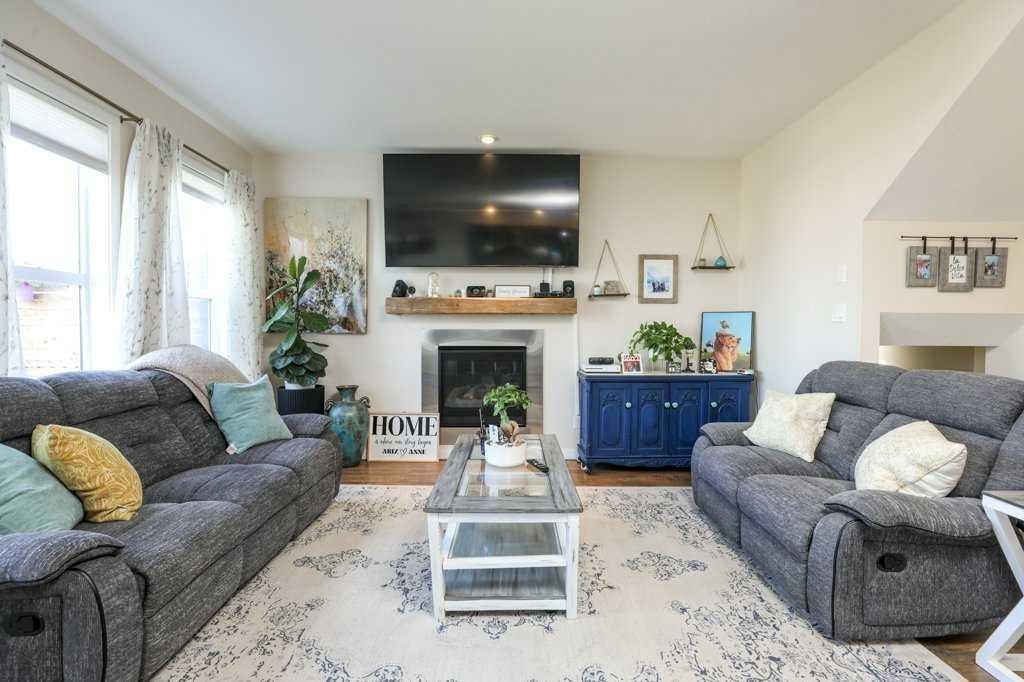 7 Greywolf Road North, Lethbridge, AB - Indoor Photo Showing Living Room With Fireplace