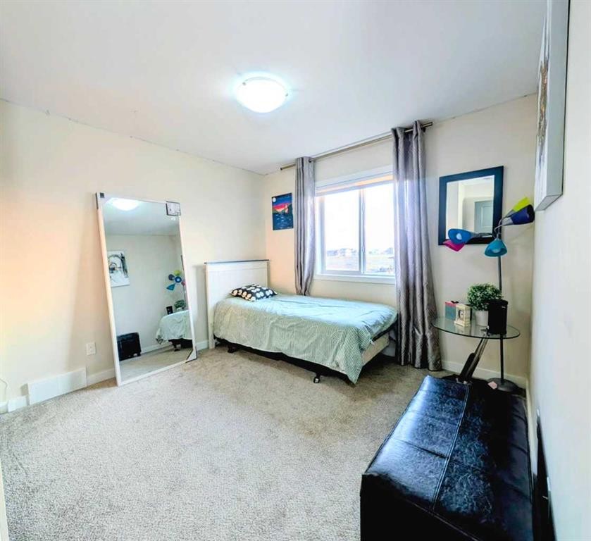 7 Greywolf Road North, Lethbridge, AB - Indoor Photo Showing Bedroom