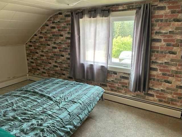 6001 16 Avenue, Coleman, AB - Indoor Photo Showing Bedroom