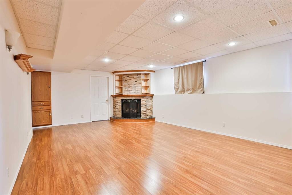1012 24 Avenue, Coaldale, AB - Indoor With Fireplace