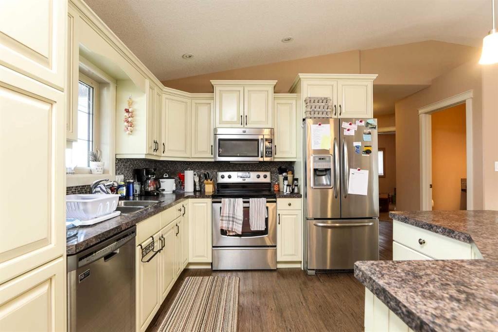 5103 62 Avenue, Taber, AB - Indoor Photo Showing Kitchen With Double Sink