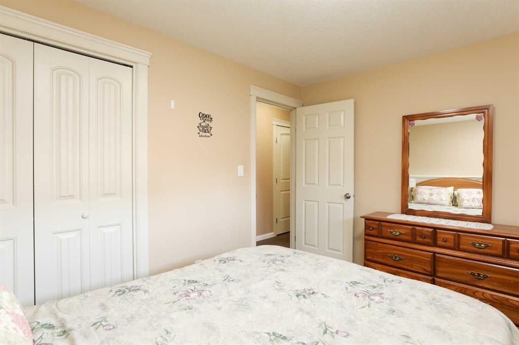 5103 62 Avenue, Taber, AB - Indoor Photo Showing Bedroom
