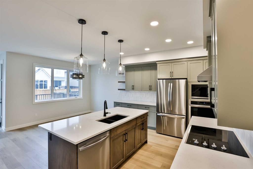 668 Devonia Road West, Lethbridge, AB - Indoor Photo Showing Kitchen With Stainless Steel Kitchen With Double Sink