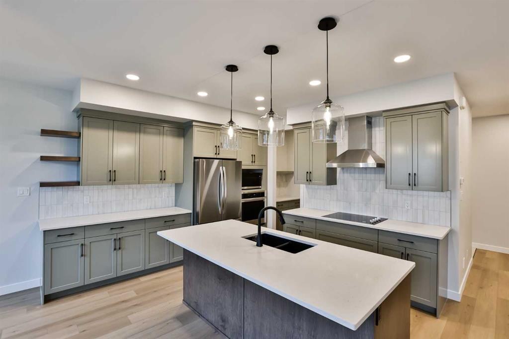 668 Devonia Road West, Lethbridge, AB - Indoor Photo Showing Kitchen With Double Sink With Upgraded Kitchen