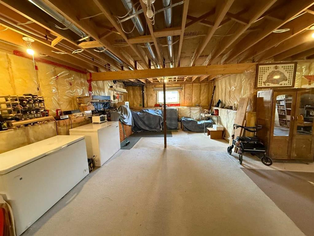 128 Heritage Boulevard West, Lethbridge, AB - Indoor Photo Showing Basement