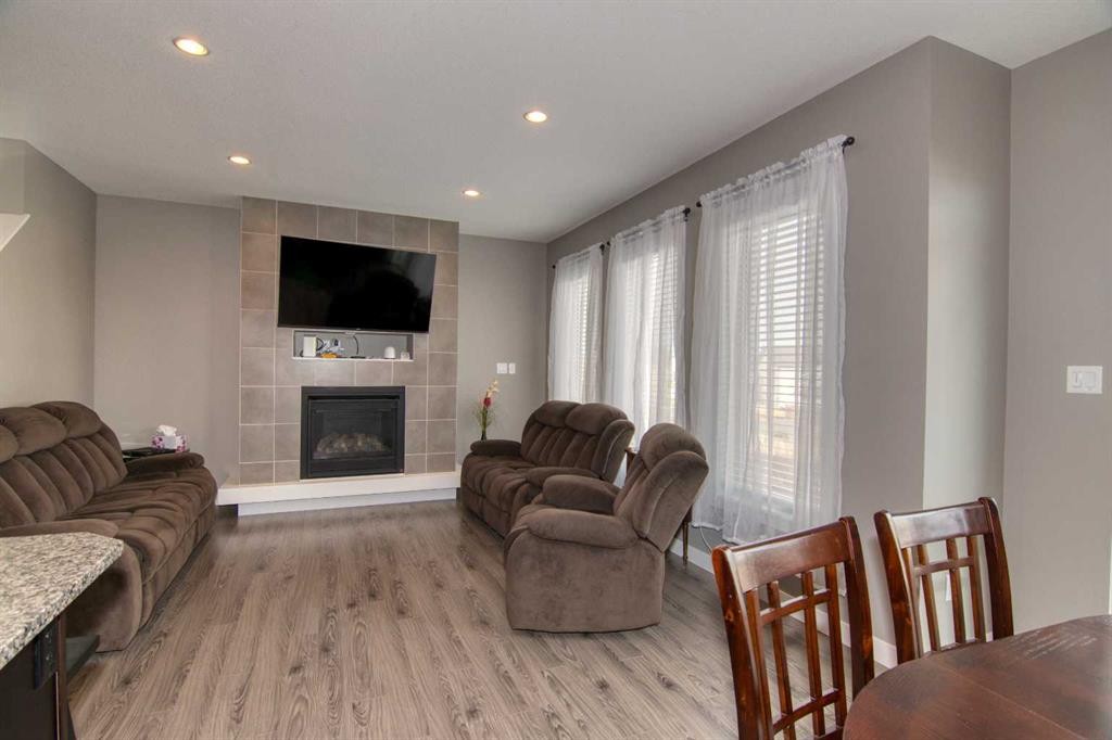 559 Moonlight Lane West, Lethbridge, AB - Indoor Photo Showing Living Room With Fireplace