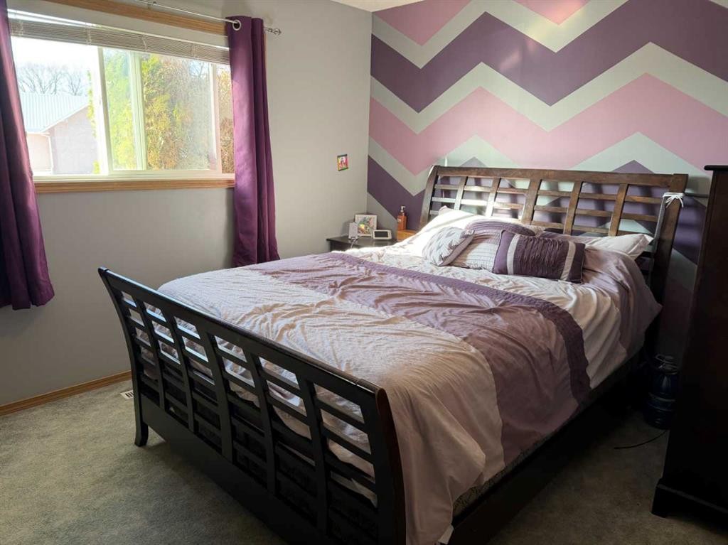 5413 38 Avenue, Taber, AB - Indoor Photo Showing Bedroom