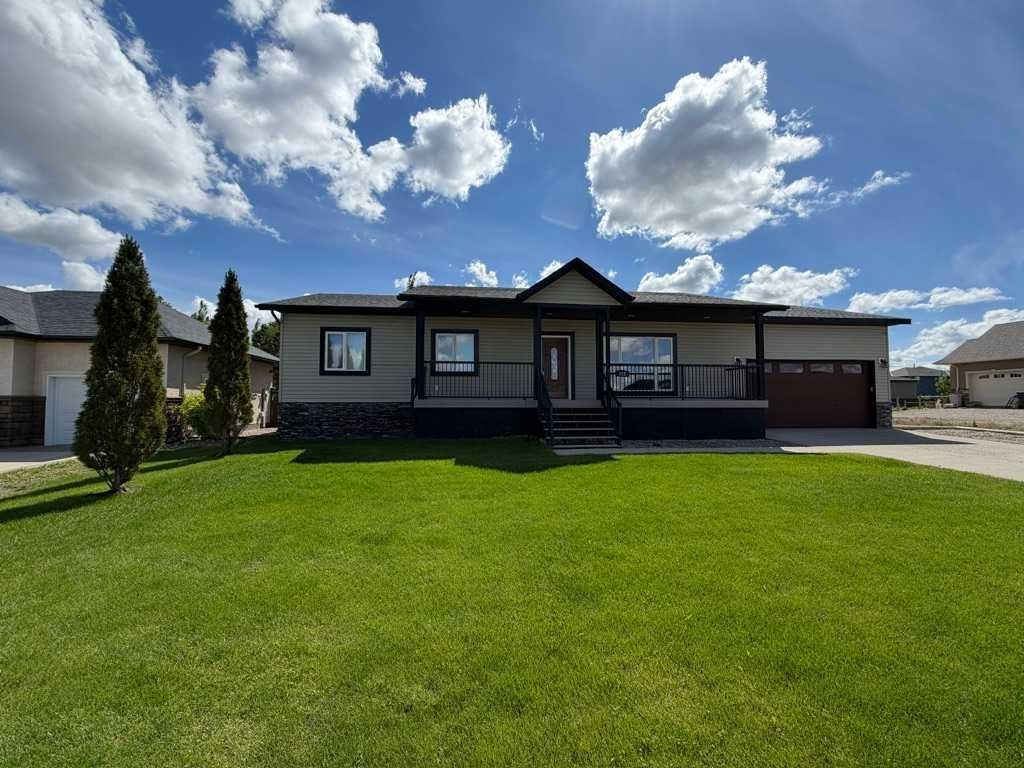 222 6A Street, Stirling, AB - Outdoor With Deck Patio Veranda With Facade