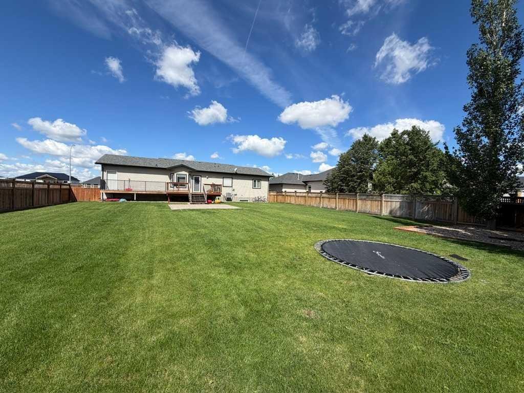 222 6A Street, Stirling, AB - Outdoor With Backyard