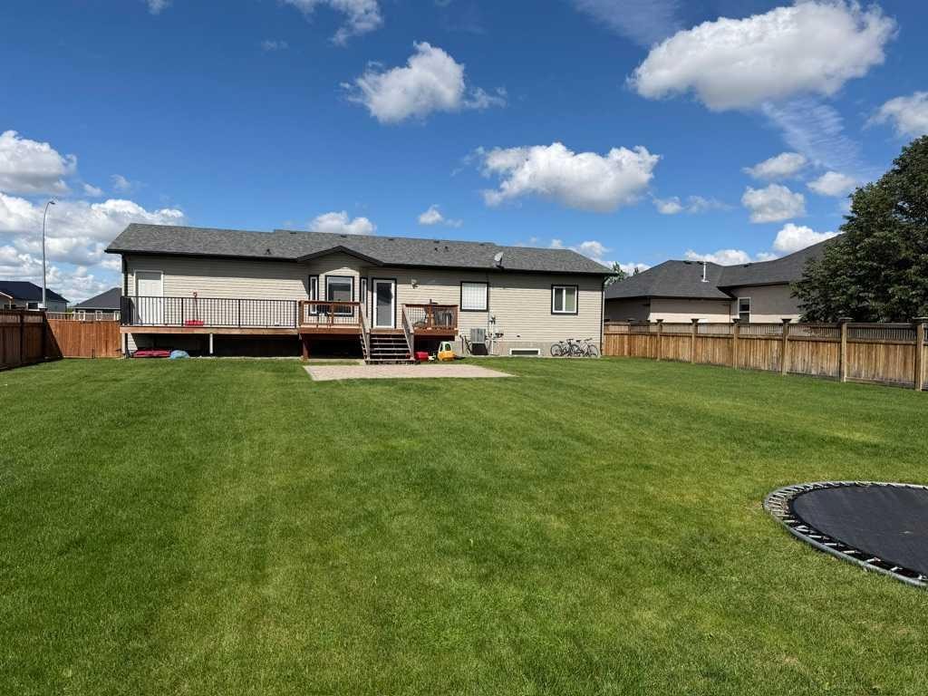 222 6A Street, Stirling, AB - Outdoor With Deck Patio Veranda With Backyard