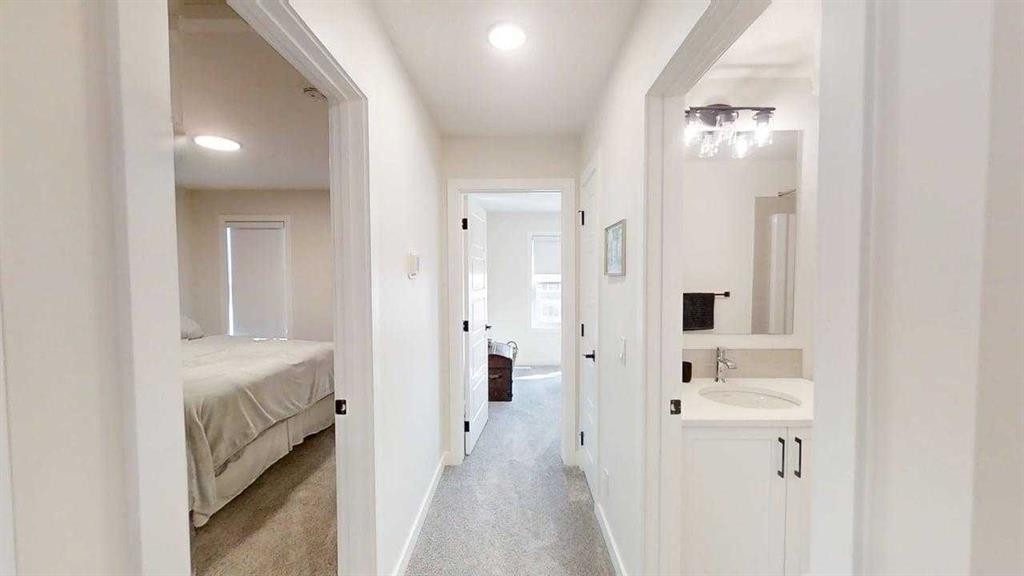 28 Aster Link, Okotoks, AB - Indoor Photo Showing Laundry Room