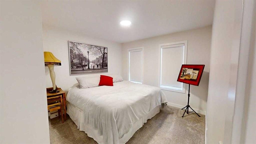 28 Aster Link, Okotoks, AB - Indoor Photo Showing Bedroom