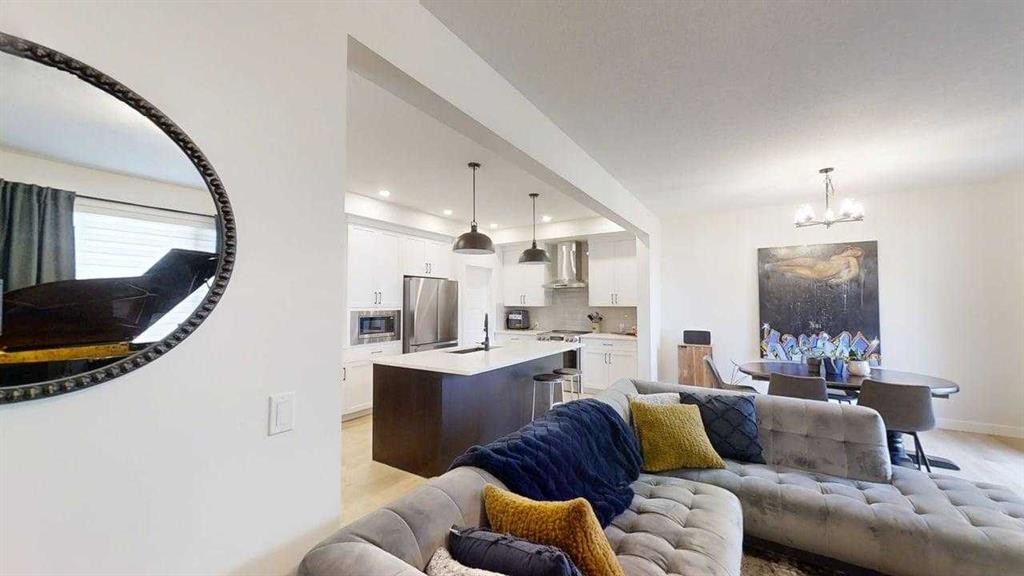 28 Aster Link, Okotoks, AB - Indoor Photo Showing Living Room