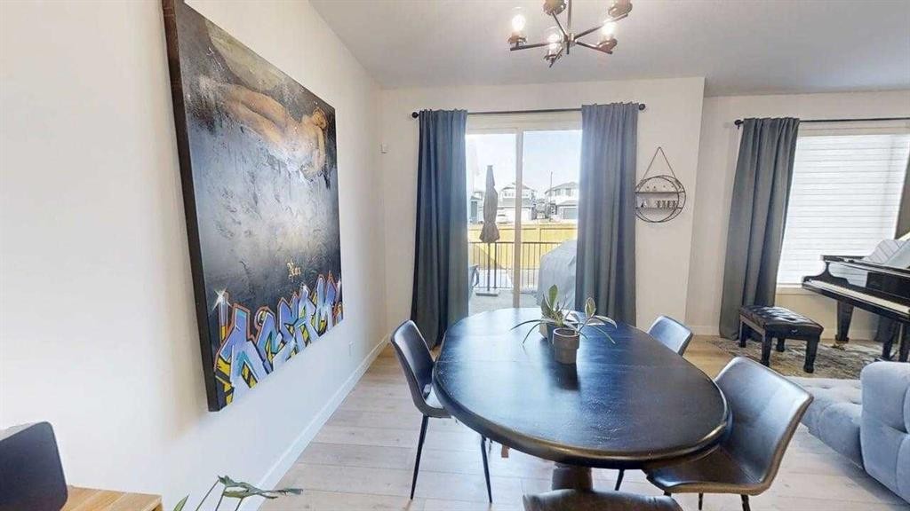 28 Aster Link, Okotoks, AB - Indoor Photo Showing Dining Room
