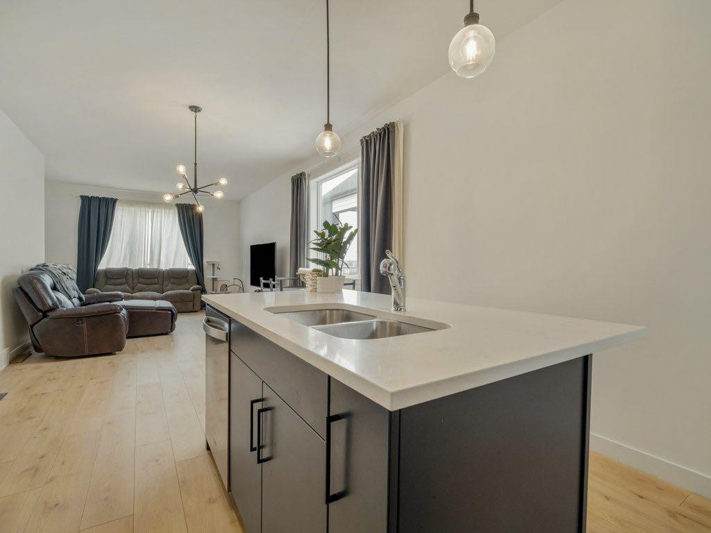 308 Uplands Boulevard North, Lethbridge, AB - Indoor Photo Showing Kitchen With Double Sink