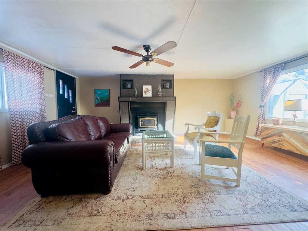 15030 21 Aveunue, Frank, AB - Indoor Photo Showing Living Room With Fireplace