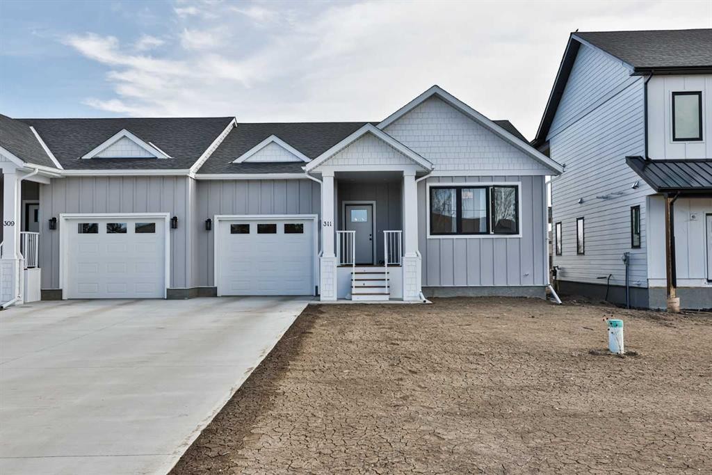 311 S 100 W, Raymond, AB - Outdoor With Facade