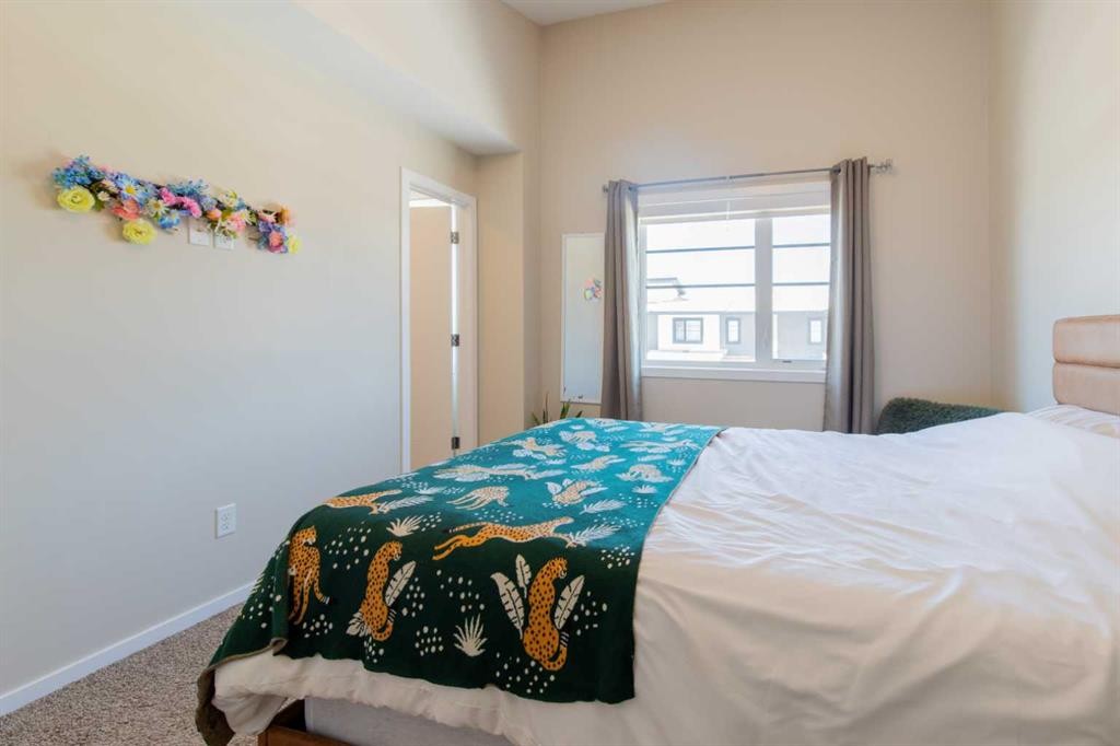 5-418 Highlands Boulevard West, Lethbridge, AB - Indoor Photo Showing Bedroom