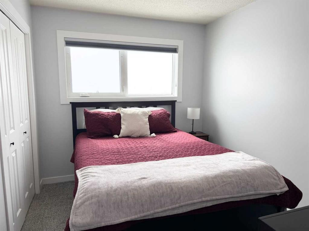 8142 26 Avenue, Coleman, AB - Indoor Photo Showing Bedroom