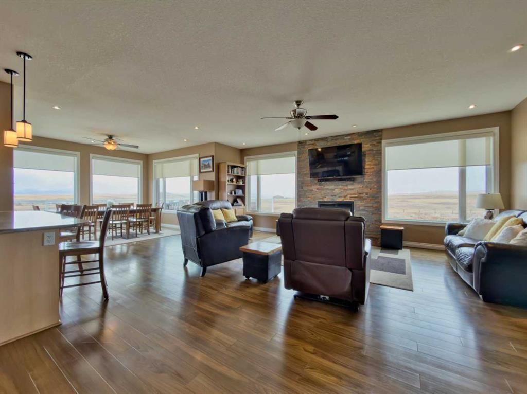 5 Walking Plow Estates, Cowley, AB - Indoor Photo Showing Living Room With Fireplace