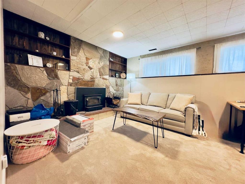 2802 77 Street, Coleman, AB - Indoor With Fireplace