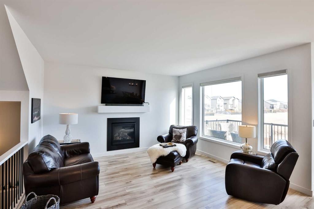 56 Greywolf Road North, Lethbridge, AB - Indoor Photo Showing Living Room With Fireplace