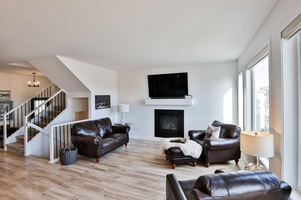 56 Greywolf Road North, Lethbridge, AB - Indoor Photo Showing Living Room With Fireplace