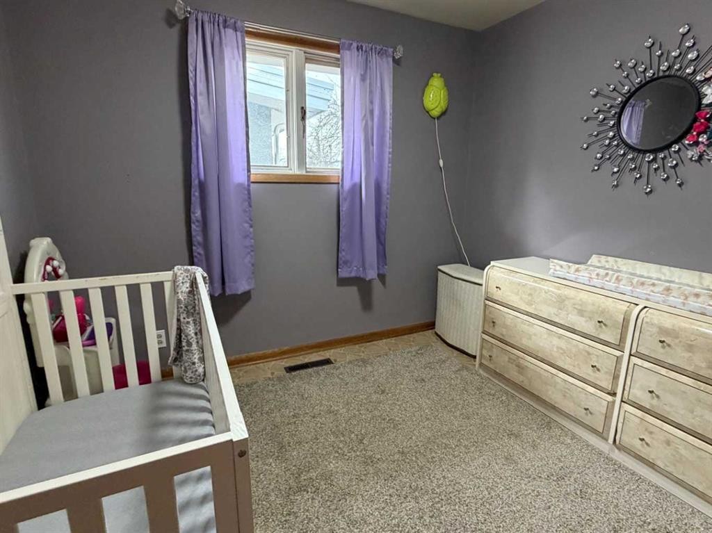 5212 51 Street, Taber, AB - Indoor Photo Showing Bedroom