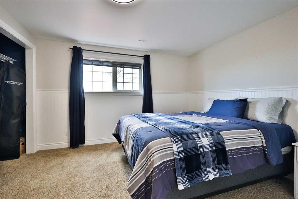 609 7 Avenue, Stirling, AB - Indoor Photo Showing Bedroom