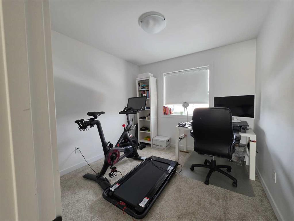 633 Blackwolf Boulevard North, Lethbridge, AB - Indoor Photo Showing Gym Room