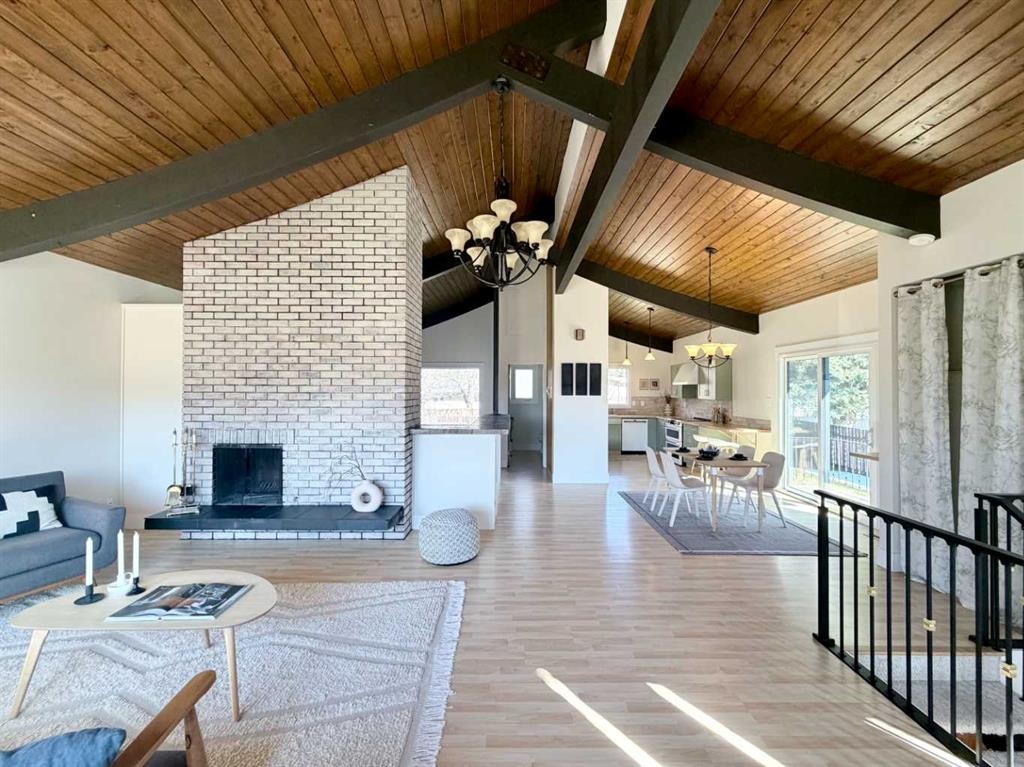 345 Laval Boulevard West, Lethbridge, AB - Indoor Photo Showing Living Room With Fireplace