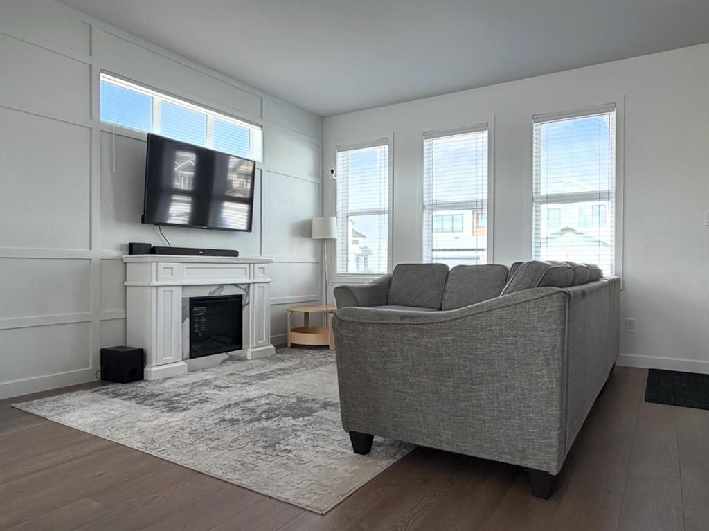 47 Blackwolf Pass North, Lethbridge, AB - Indoor Photo Showing Living Room With Fireplace