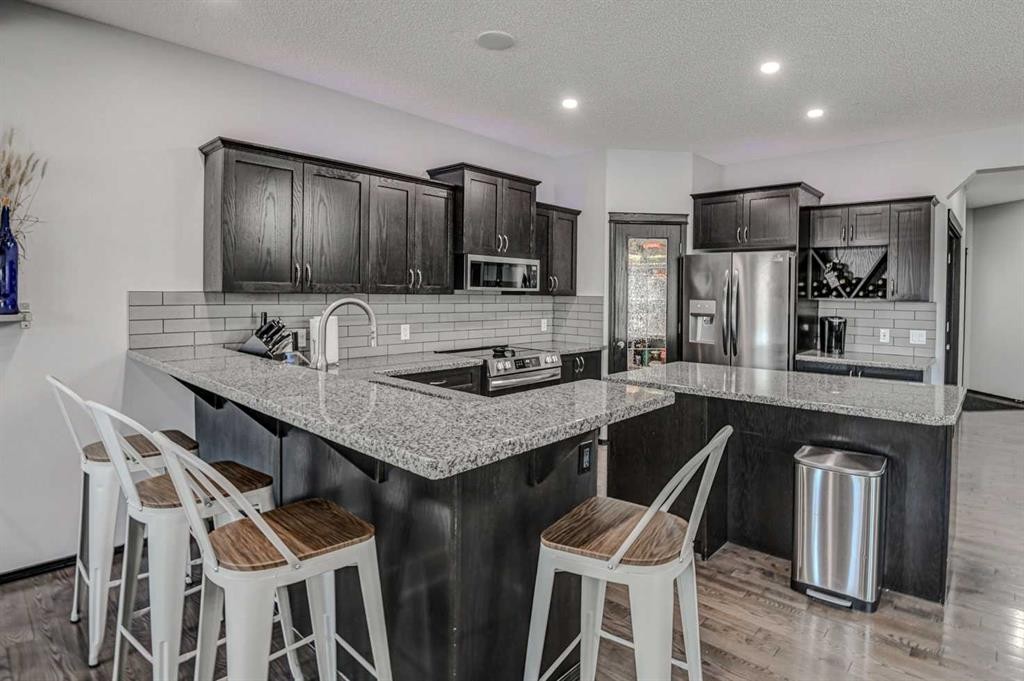 23 Cranberry Circle Se, Calgary, AB - Indoor Photo Showing Kitchen With Stainless Steel Kitchen With Upgraded Kitchen