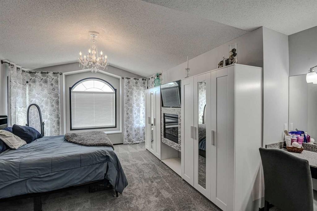 23 Cranberry Circle Se, Calgary, AB - Indoor Photo Showing Bedroom
