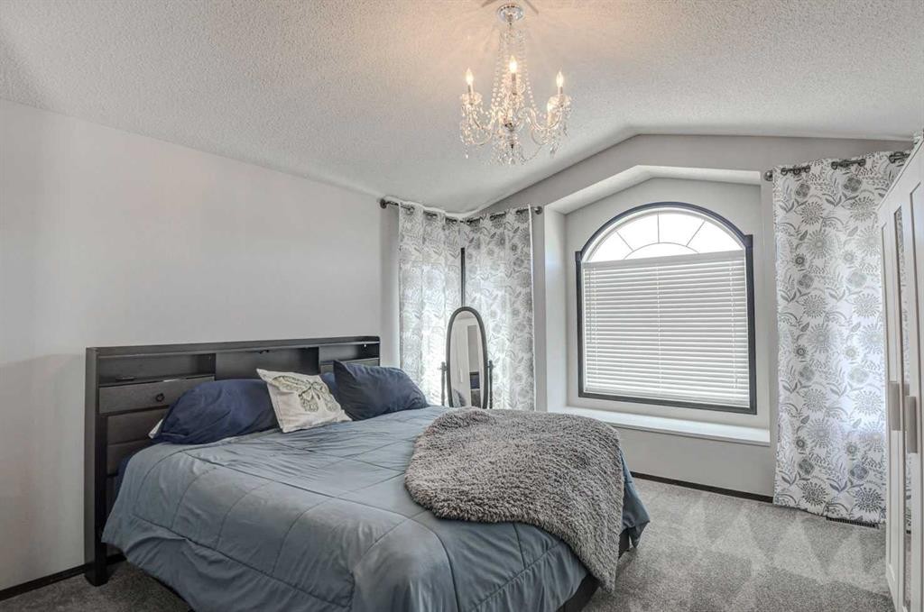 23 Cranberry Circle Se, Calgary, AB - Indoor Photo Showing Bedroom