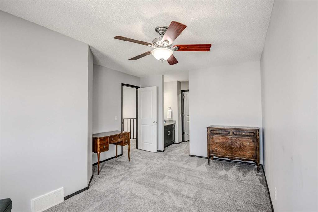 23 Cranberry Circle Se, Calgary, AB - Indoor Photo Showing Other Room