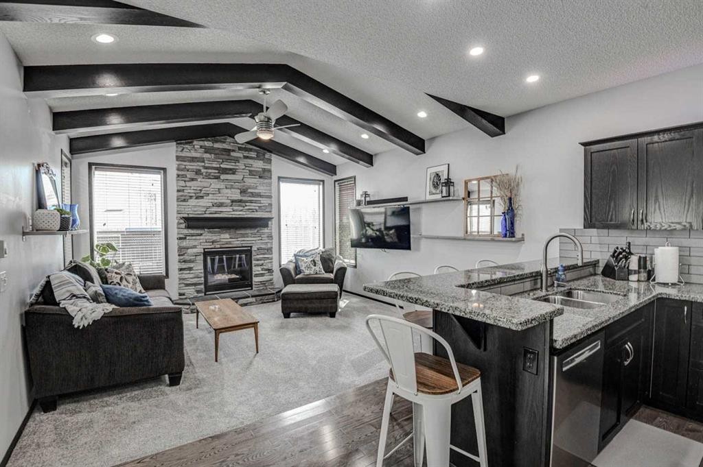 23 Cranberry Circle Se, Calgary, AB - Indoor With Fireplace