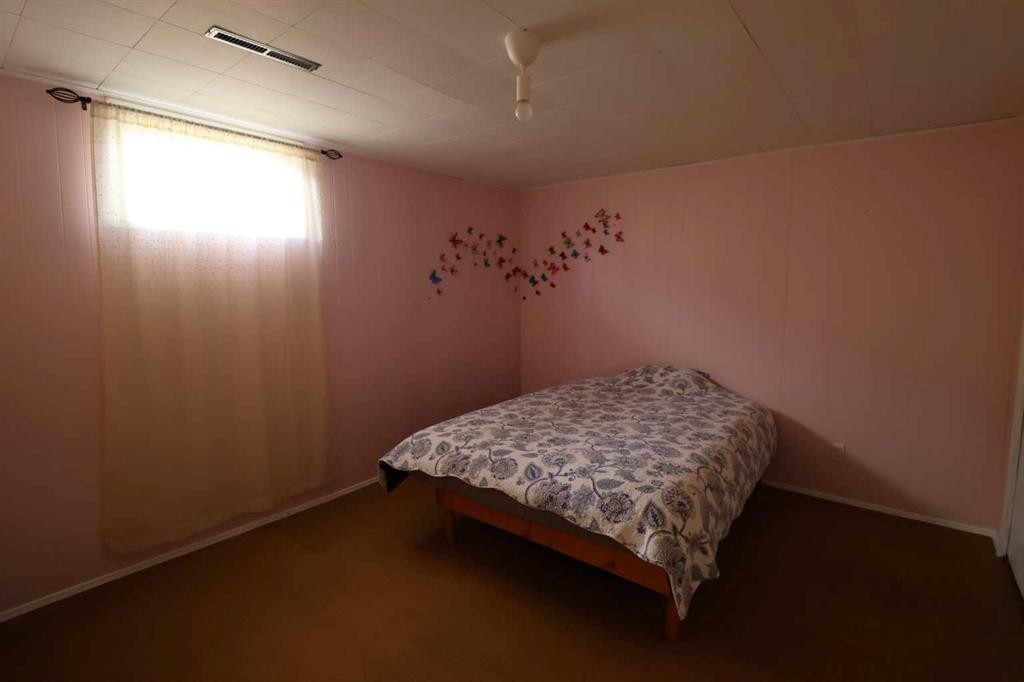2214 19 St, Coaldale, AB - Indoor Photo Showing Bedroom