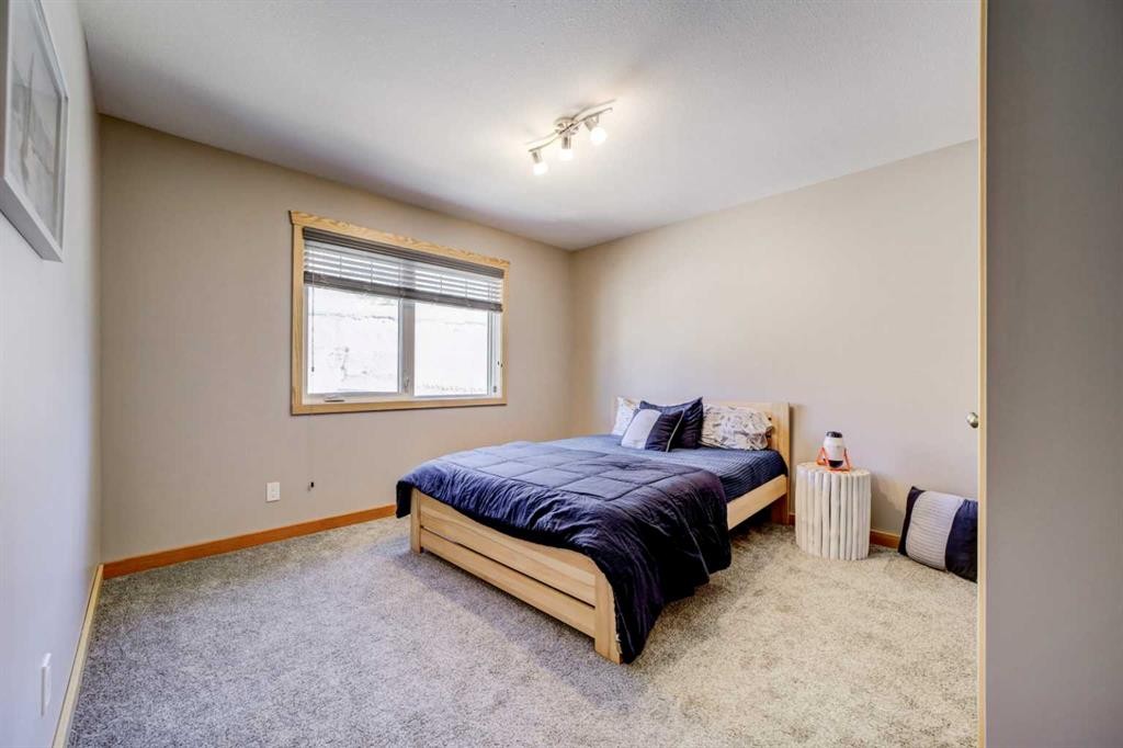 75 Ironstone Drive, Coleman, AB - Indoor Photo Showing Bedroom