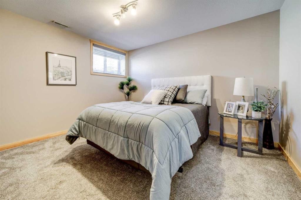 75 Ironstone Drive, Coleman, AB - Indoor Photo Showing Bedroom