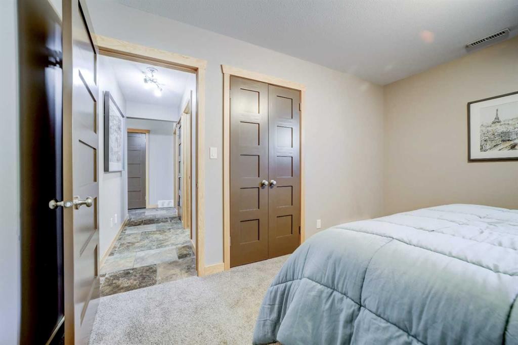 75 Ironstone Drive, Coleman, AB - Indoor Photo Showing Bedroom