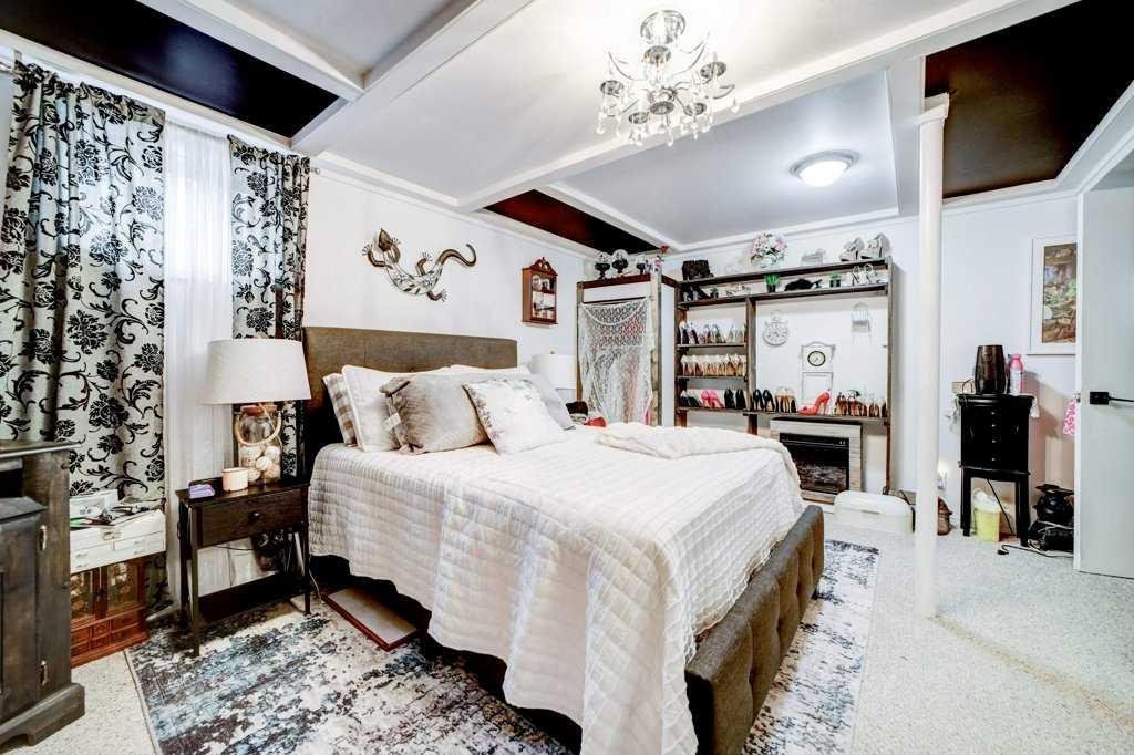 379N 300 E, Raymond, AB - Indoor Photo Showing Bedroom