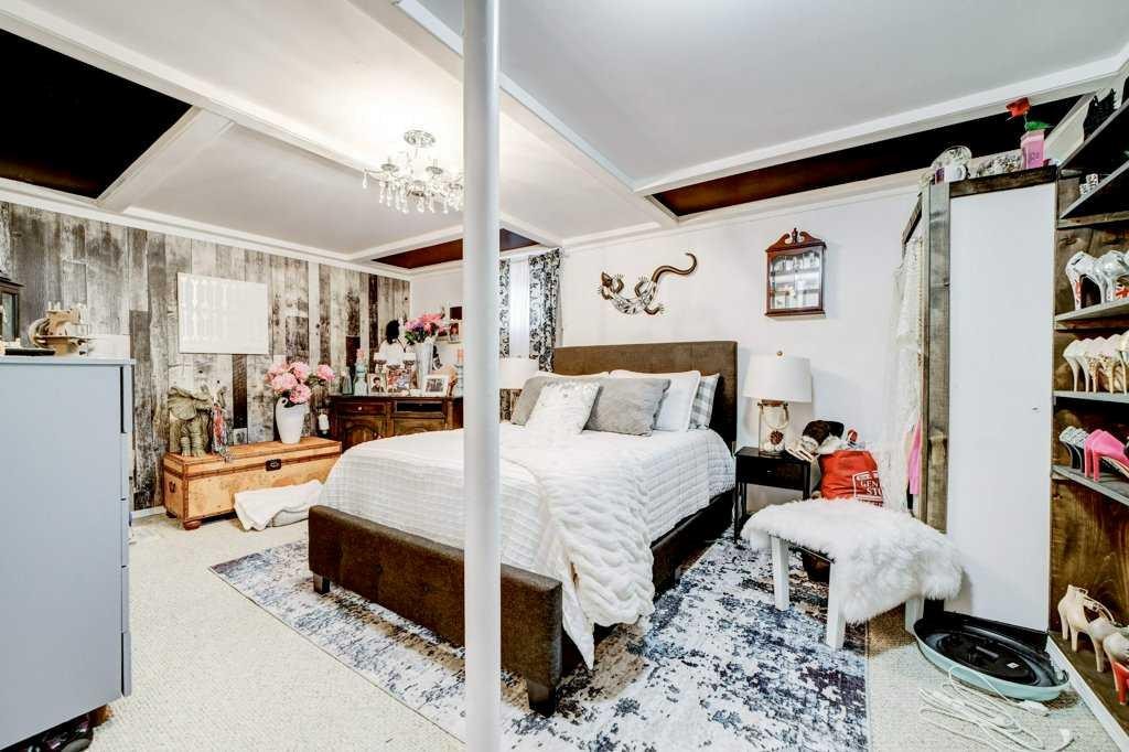 379N 300 E, Raymond, AB - Indoor Photo Showing Bedroom