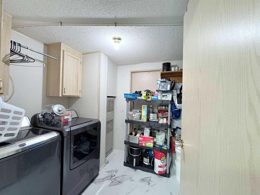 On 252 Range, Rural Cardston County, AB - Indoor Photo Showing Laundry Room