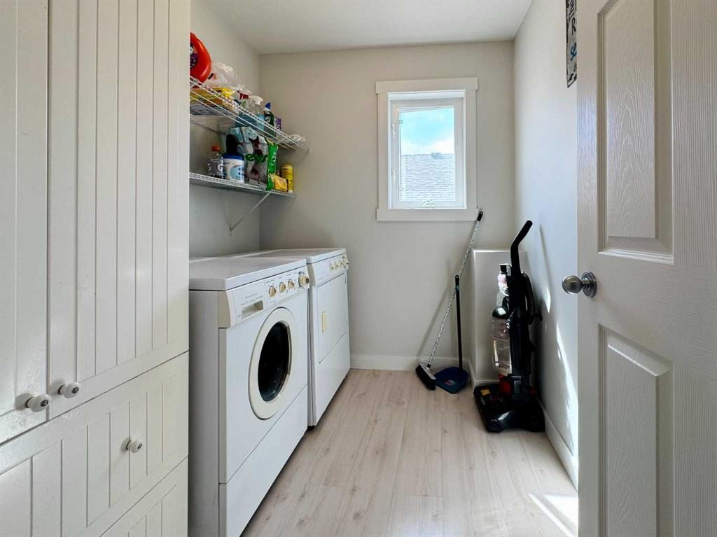 86 Riverstone Boulevard West, Lethbridge, AB - Indoor Photo Showing Laundry Room