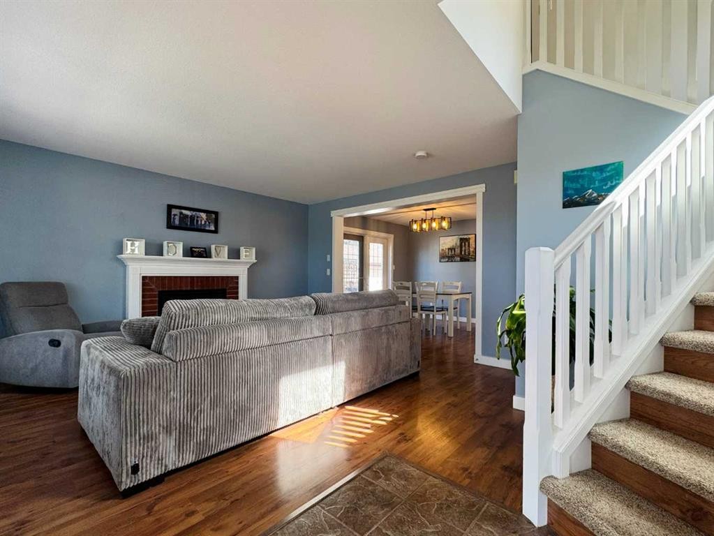 86 Riverstone Boulevard West, Lethbridge, AB - Indoor With Fireplace