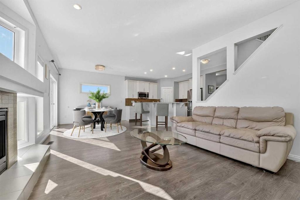 678 Twinriver Crescent West, Lethbridge, AB - Indoor Photo Showing Living Room With Fireplace