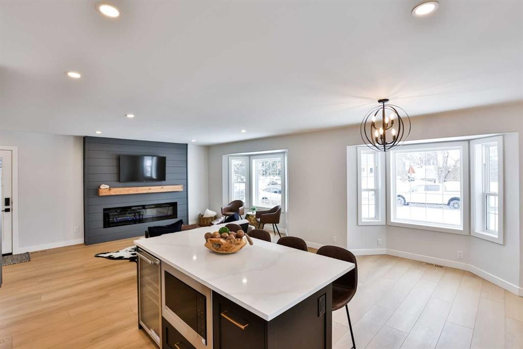 330 Wascana Crescent Se, Calgary, AB - Indoor Photo Showing Living Room With Fireplace
